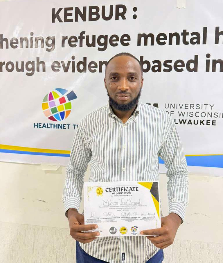 Participant with his diploma Interpersonal Psychotherapy Training Burundi