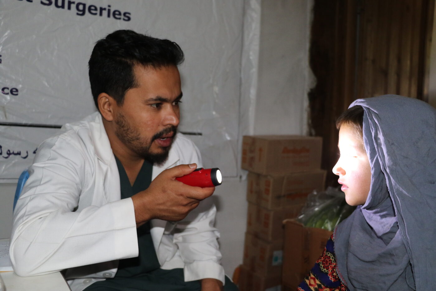 Afghan girl eye care check